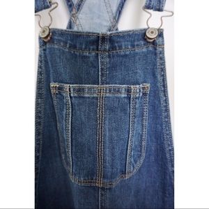 Tomgirl denim overalls.